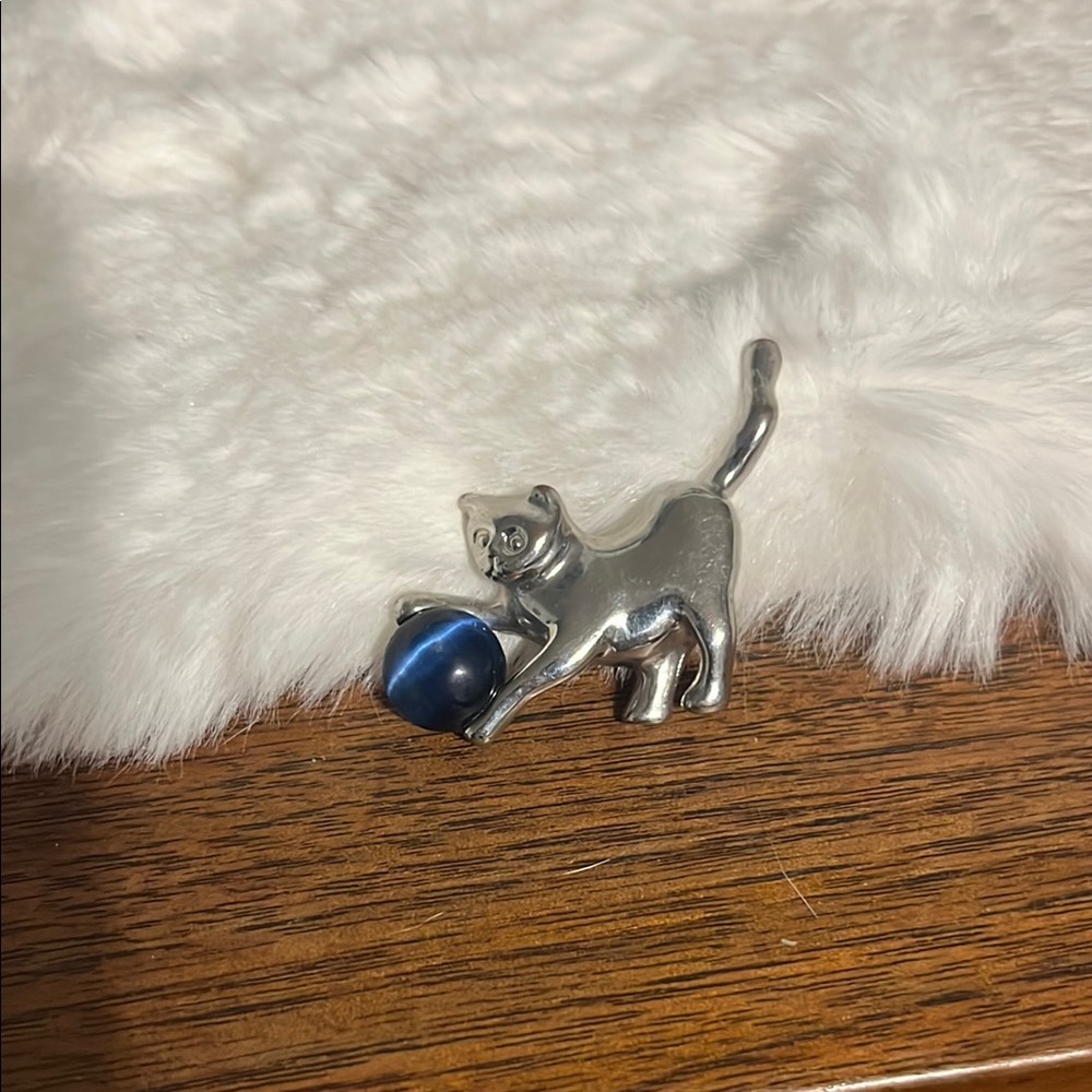 Silver Cat Figurine with Blue Ball